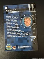 Back of the Wayne Gretzky hockey card with player biography, stats, and photo headshot.