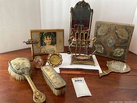 Overview of entire lot on wood table against white background