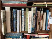 Shelf segment showing art book spines from South by Southeast through Ben Shahn