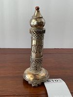 Full front view of sterling silver spice tower