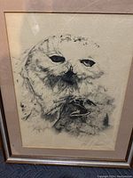 Framed print showing two owls in black and white, signed in pencil bottom right corner by Al J Casson.