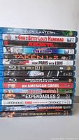 Stack of 15 Blu-ray movie cases showing titles on spines.