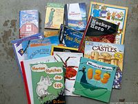 Overview of all 17 children's books showing various titles and colorful covers.