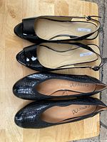 Top view of both pairs of shoes showing Geox slingback wedges and Caprice pumps