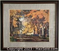 Framed painting showing an autumn street scene with trees and houses, signed lower right by A.J. Casson.