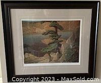 Framed print of "Upper Ottawa" by Franklin Carmichael with visible signature and edition number, showing overall condition and framing.