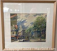 Framed watercolor painting of a Montreal street scene signed by James Crockart in 1954.