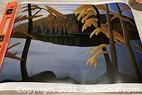 Photo showing the full unframed painting "A Northern Lake" by Lawren Harris with visible signature and clear view of the composition featuring trees, lake, and mountains.