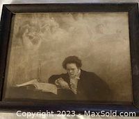 Full front view of the framed vintage canvas print depicting Beethoven seated with book and candle.