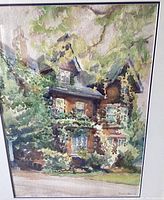 Close-up view of the watercolour painting showing details of the old house and surrounding greenery.