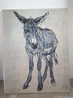 Front view of the lithograph on canvas showing a donkey foal illustration signed 'hug'