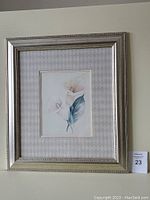Front view of the framed calla lily print showcasing the floral artwork, patterned mat, and decorative silver frame.
