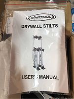 User manual for Gyptool Drywall Stilts with brand and product image on front cover.
