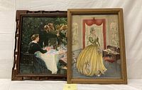 Two framed art prints: one showing an outdoor dining group, the other a Victorian lady indoors.