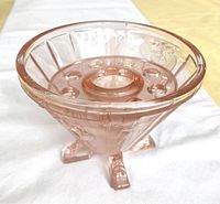 Top down view of pink glass, showing the interior structure and foot details.