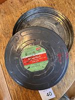 Top view of Kodak Eastman Plus-X canister showing original Kodak label and embossed circular design.