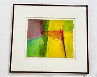 Frontal view of the framed abstract colorful acrylic painting on paper.