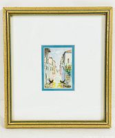 Framed watercolour painting entire view showing gold frame, white mat with blue inner border, and small painting centered.