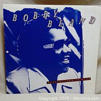Front cover of Bobby Bland 'Reflections in Blue' vinyl album showing artwork and artist name.