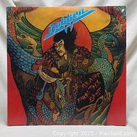 Front cover art showing samurai and dragon artwork with Dokken logo and album title Beast from the East.