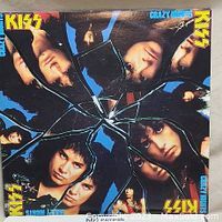 Front cover of Kiss 'Crazy Nights' vinyl album with shattered glass band member faces.