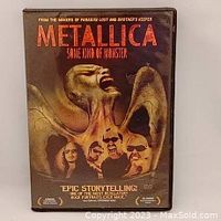 Front cover of Metallica Some Kind of Monster DVD showing the stylized artwork with band member images and title text.