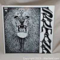 Front cover of Santana's self-titled album with distinctive roaring lion artwork and stylized text.