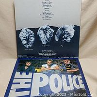 Inner sleeve of The Police album showing black and white sketch of band members' heads and song lyrics.