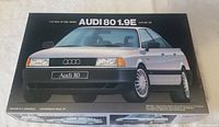 Box top featuring artwork of the Audi 80 1.9E model car in silver color with model name and brand details printed on the box.