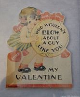 Front of die-cut Valentine card with child blowing bubble and hearts saying 'Who wouldn't blow about a guy like you my Valentine'