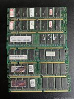Image showing six assorted green PCB desktop RAM modules with varied chip layouts and labels from brands including Kingston and Hynix.
