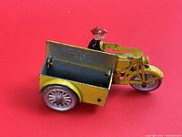 Yellow motorcycle with sidecar and driver