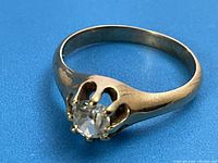 Ring viewed from above showing round-cut diamond in six-prong setting