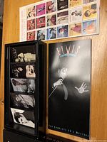 Box open showing CDs and booklet with Elvis images