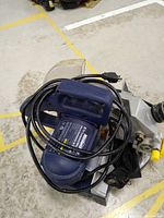 Top view of Mastercraft 8 1/4 compound mitre saw showing motor, blade cover, and power cord.