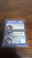 Front view of Iconic Ink Triple Cuts card showing facsimile autographs of Babe Ruth, Derek Jeter, Aaron Judge with their photos