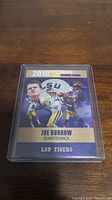 Front side of the 2018 Joe Burrow rookie card showing player images and LSU Tigers text.