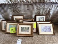All nine framed prints displayed leaning against a couch. Frames vary in style and size approximately 5x3 inches each. Yellow sticky notes note 'Miniature Paul Sawyer's'.