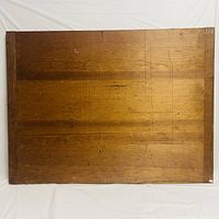 Full view of large rectangular oak board showing wood grain and surface scratches