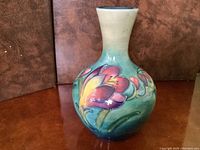 Front view of Moorcroft floral vase showing colors and condition.