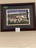 Front view of the framed artwork showing the detailed wash day scene with townscape background.