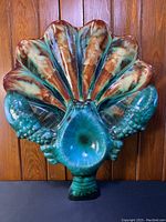 Front view of the large ceramic lobster chip dip bowl showing detailed green lobster on shell shape with brown and green glaze