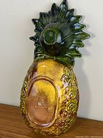 Back view of the pineapple chip and dip bowl showing the embossed Metlox USA stamp.