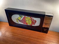 Boxed Tech Deck miniature skateboard deck with art by Billy Ruff for G&S 1984, shown hanging in shadow box display case.