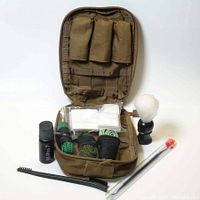 Open view of the tan MOLLE nylon field pouch with cleaning patches, BoreSnakes, dust brush, nylon utility brush, dental pick with storage case, empty bottle with dispenser, and magnet pad arranged in front.