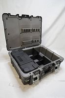 Open view showing inside compartments and pull-out tray in closed tool case