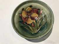 Top view of the bowl showing detailed floral design inside.