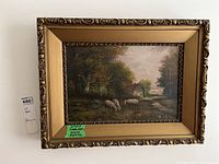 Frontal image of the framed oil painting showing the full artwork including signature and frame, indicating size and condition of the piece.