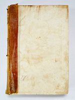 Front cover showing vellum binding split and discolored with a worn spine and corners.