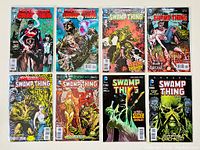 Seven DC Swamp Thing comic books arranged in two rows, all bagged and boarded.